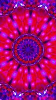 Red and blue circular object with red center. Kaleidoscope VJ loop Vertical video