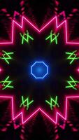 Colorful star pattern with black background and red center. Kaleidoscope VJ loop Vertical video