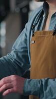 Small business owner thoughtful man Caucasian middle-aged male barista inspector technician ponder writing notes check coffee roaster machine equipment on factory industry worker inspect manufacture video