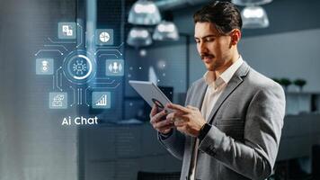 Professional man engaging with AI chat technology in an office setting during work hours photo