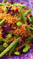 Vibrant Green Beans Salad with Crispy Toppings and Purple Cabbage photo