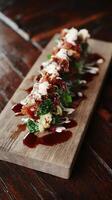 Delicious Appetizer With Sauce Drizzled Over Fresh Ingredients. photo