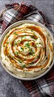 Creamy Mashed Potatoes With Savory Gravy and Fresh Chives. photo