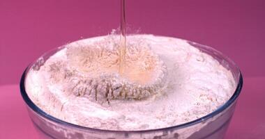 A blender filled with white powder photo