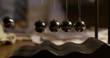 A bunch of black balls on a table photo