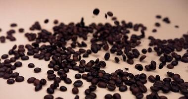 Coffee beans are scattered on a table photo