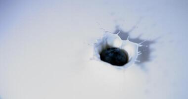 A hole in the wall with a blue ball inside photo