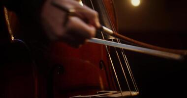 A close up of a cello player's hands photo