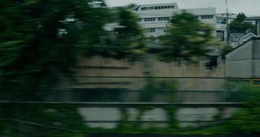 A blurry photo of a building with trees in the background video
