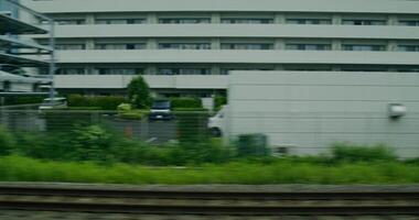 A train passing by a building video