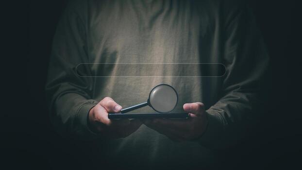 Information search technology, search engine optimization, male hand using a phone to search information, using the search bar function on your website photo