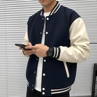 Man Wearing Blank Varsity Jacket for Design Mockup photo