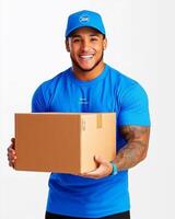 A smiling delivery man in blue uniform holding a cardboard box against white background photo