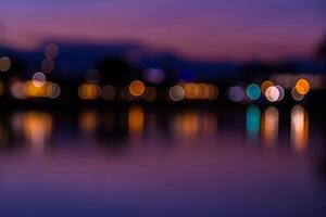 A blurry photo of a city at night with lights