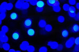 Blue lights on a black background photo