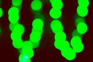 Green lights on a black background photo