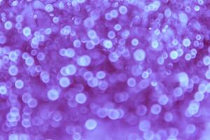 A purple background with many small bubbles photo