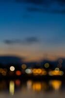 A blurry photo of a city at dusk