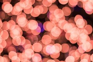 A blurry image of a pink and purple light photo