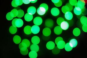 Green lights are shown in a dark background photo