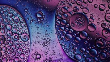 Abstract Colorful Organic Food Oil Drops Small Bubbles on Water video