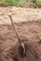 Construction Site with a Shovel in a Mound of Dirt photo