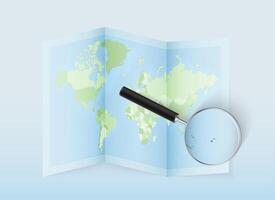 World map with magnifying glass vector