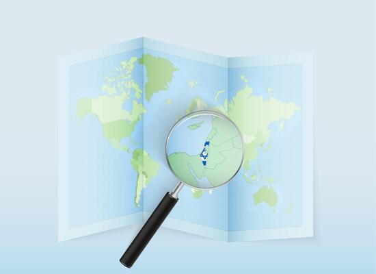 A folded world map with a magnifying lens pointing towards Israel. Map and flag of Italy in loupe.