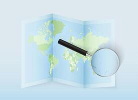 World map and magnifying glass vector