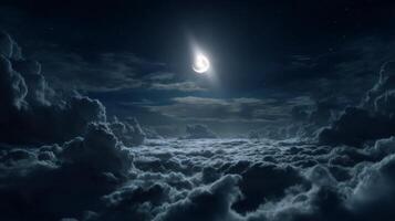 Serene Night Sky with Crescent Moon Illuminating Soft Clouds in a Twilight Atmosphere Above a Dreamy Landscape photo