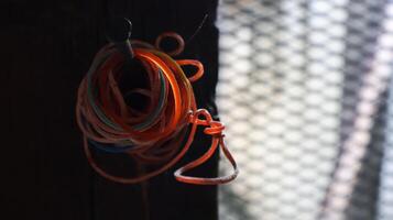 Used rubber bands collected for recycling photo