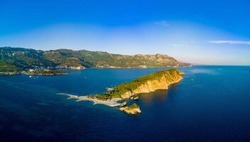 Panorama of island of St. Nicholas with vegetation in the Adriat photo