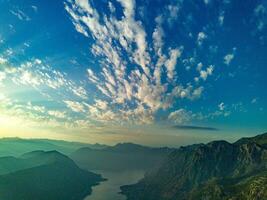 Sun illuminates peaks of Montenegrin mountains photo
