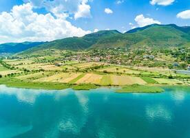 Fields planted with grain crops near Montenegrin villages on the photo