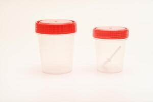 Medical analysis container. Jars for urine and fecal tests. Containers for medical tests. photo