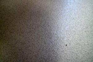 Textured Beige Surface with Subtle Sheen photo