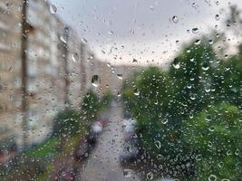Window view background with raindrops photo