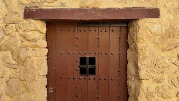 A wooden door in a stone building video