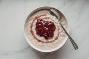 a bowl of creamy oatmeal porridge photo