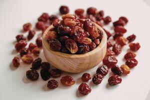 Bowl of dried cranberries photo