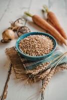 Bowl of whole grains with vegetables photo