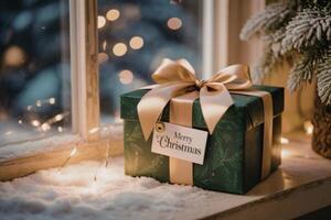 Christmas gift with a gold bow photo