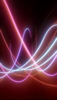 Colorful neon light trails forming abstract curves over a dark backdrop with warm glow video