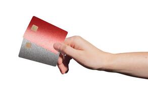 Electronic bankcard pair. Hand holding two modern plastic cards with chip for credit, debit, photo
