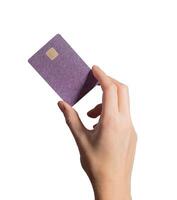 Smart finance exchange. Hand holding plastic bankcard with chip in closeup for credit, debit, photo