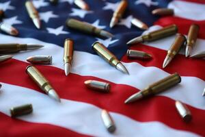 Bullets with USA flag in light. Patriotic background image with ammo and United States flag photo
