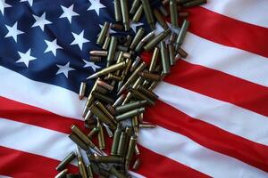 Bullets with USA flag in dark light. Patriotic background image with ammo and United States flag photo