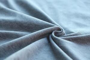 Gray Cotton fabric, weaving of threads texture, curl crumpled fold. photo