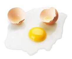 Broken egg on a white photo