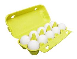 Cardboard egg box with eggs photo